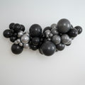 DIY balloon garland kit in black, grey and silver, professional grade, latex balloons. Styled in a professional organic garland.